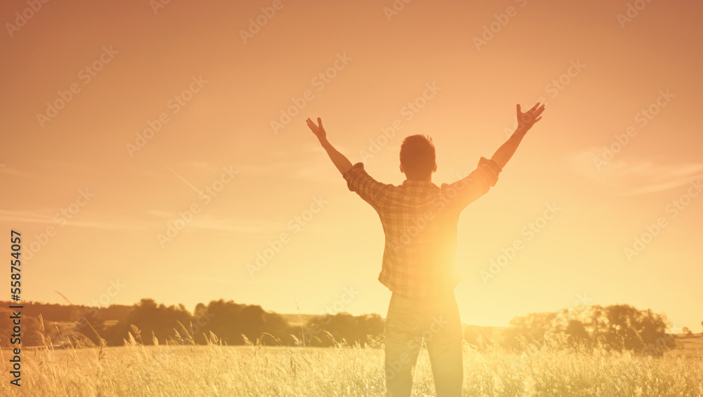 Young in nature sunrise with feelings of home and happiness Young in nature sunrise with feelings of home and happiness