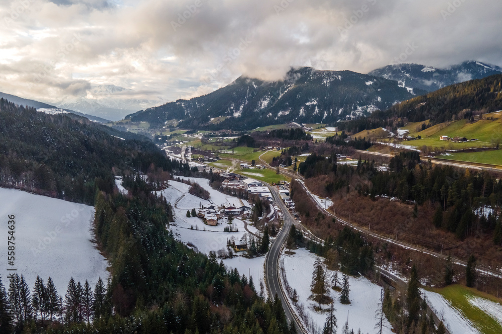 Aerial view of a winter mountain landscape with snow in Eben Im Pongau, Salzburg, Austria. Aerial view of a winter mountain landscape with snow in Eben Im Pongau, Salzburg, Austria.