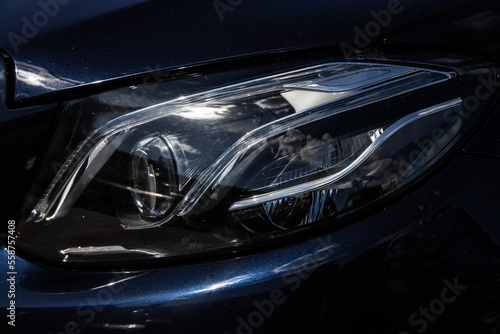 headlights with laser technology of a stylish fashionable modern sedan SUV