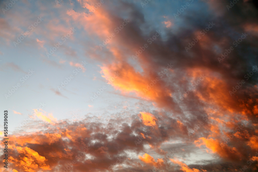 sunset sky with dark orange clouds for background