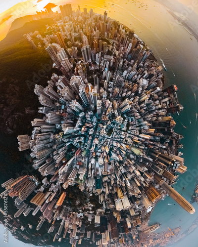 Aerial 360 degrees view Hong Kong island downtown at sunset, China.