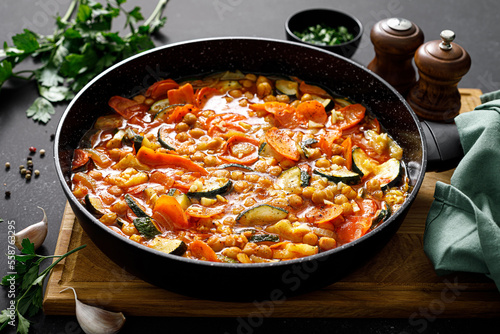 Chickpea and zucchini saute with carrot and garlic. Classic italian side dish