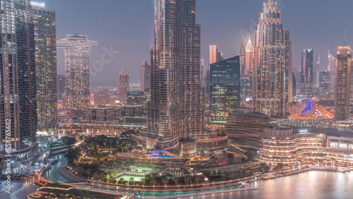 Aerial view of Dubai city day to night timelapse in downtown.