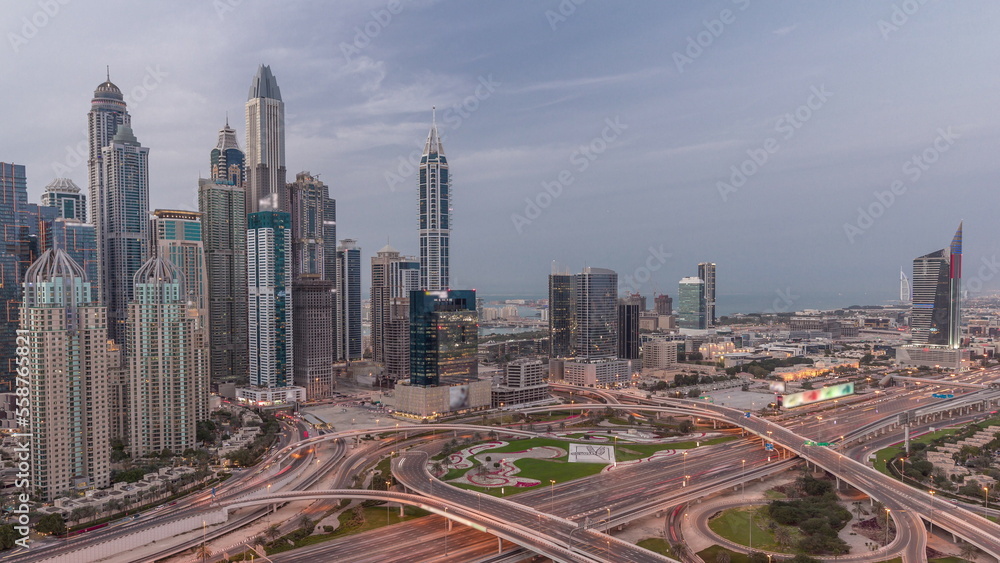 Obraz premium Dubai Marina highway intersection spaghetti junction day to night timelapse