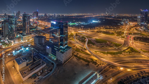Print op canvas Aerial panoramic view of media city district and highway junction all night time