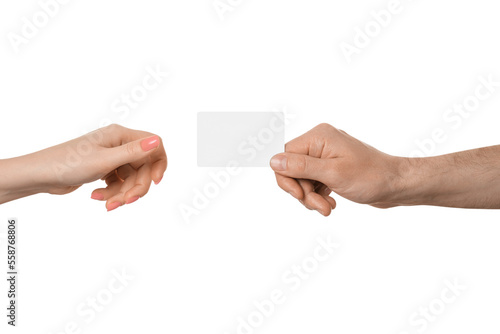Transferring an empty plastic card or business card from a male hand to a female on a white background. Female hand with pink manicure.