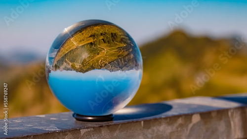 Photography Crystal ball alpine summer landscape shot at the famous Walmendinger Horn summit