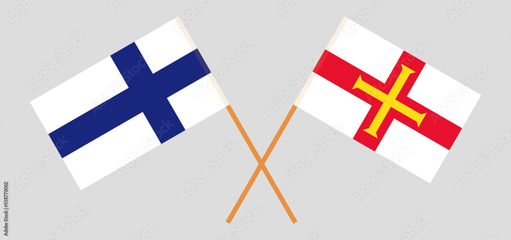 Crossed flags of Finland and Bailiwick of Guernsey. Official colors. Correct proportion