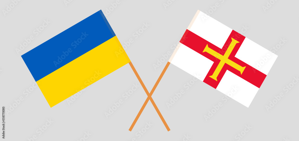 Crossed flags of Ukraine and Bailiwick of Guernsey. Official colors. Correct proportion