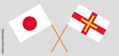 Crossed flags of Japan and Bailiwick of Guernsey. Official colors. Correct proportion