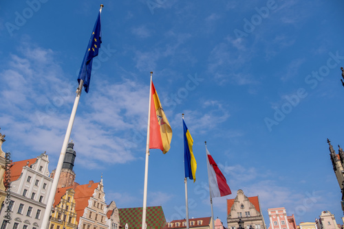 flags on the roof of a building