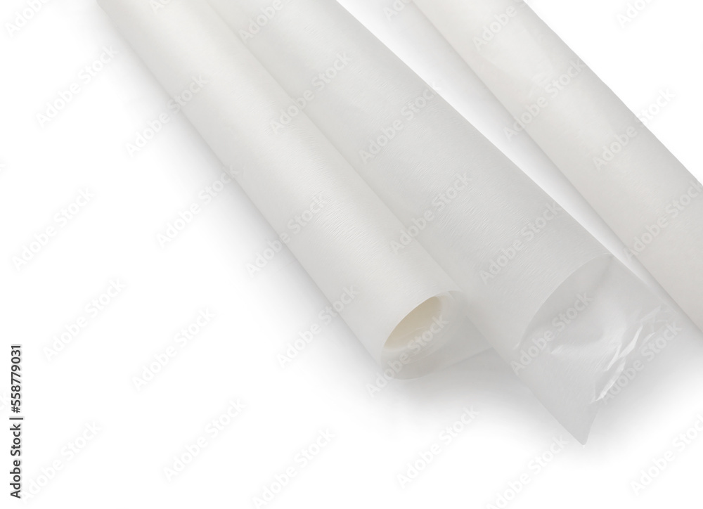 Rolls of baking paper on white background Rolls of baking paper on white background