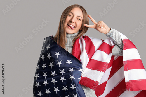 Beautiful woman with USA fl...