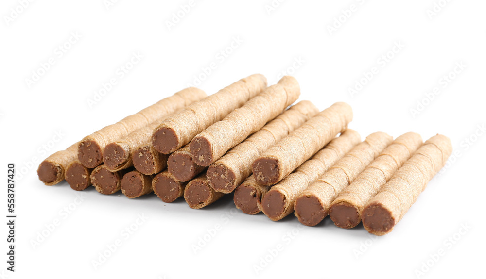 Heap of tasty wafer rolls with boiled condensed milk isolated on white background Heap of tasty wafer rolls with boiled condensed milk isolated on white background
