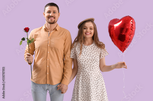 Happy young couple holding ...