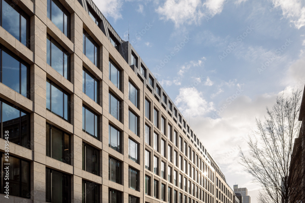 Exterior architectural detail modern facade of High-rise office buildings. Abstract Urban metropolis background.