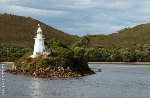 Lighthouse on an island in Macquarie Harbour, Tasmania. During the Gordon River cruise from Strahan. photo