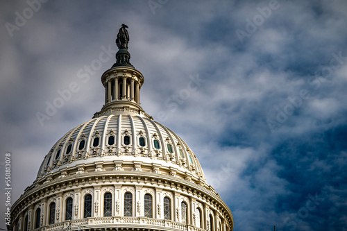 Close up view of dome of Capitol building in Washington, D.C. on a cloudy and moody day. 