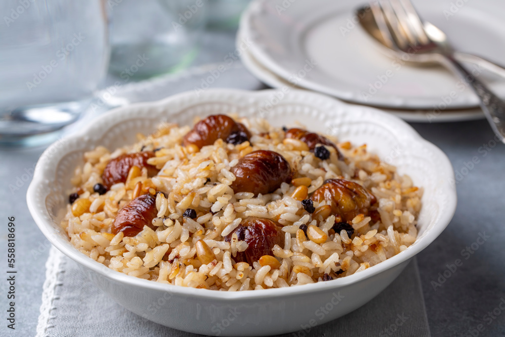 Traditional delicious Turkish food; chestnut rice pilaf (Turkish name; kestaneli pilav) Traditional delicious Turkish food; chestnut rice pilaf (Turkish name; kestaneli pilav)