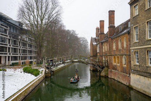 Mathematical Bridge , wooden footbridge over River Cam around University of Cambridge during winter snow at Cambridge , United Kingdom : 3 March 2018