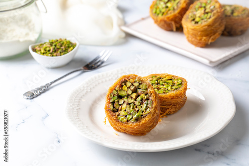 Traditional Turkish desserts; Kadaif stuffed with pistachios. Turkish name; Kadayif dolmasi or dolma kadayif