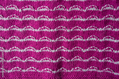 Knitted texture. Pattern fabric made of wool. Background, copy space. Handmade sweater texture, knitted wool pattern © Esin Deniz