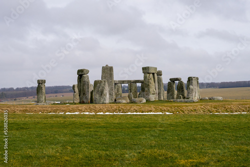 Stonehenge , World wonder historic stone monuments near Salisbury during winter cloudy day at Salisbury , United Kingdom : 5 March 2018 photo