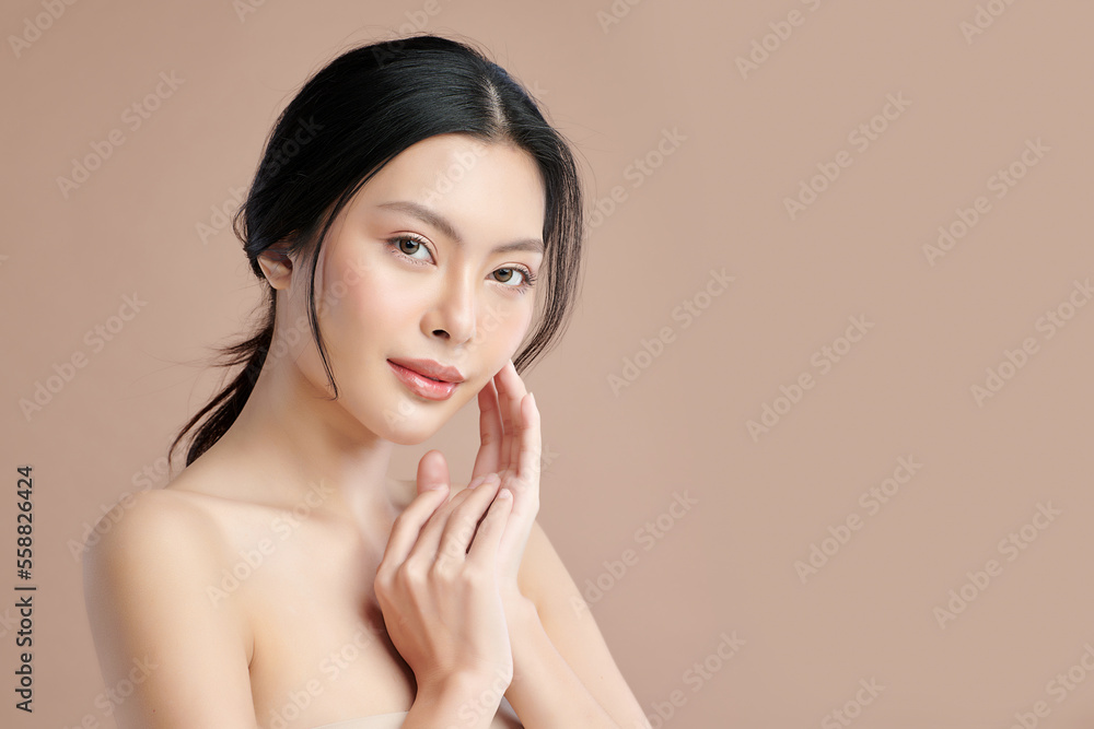 Beautiful young asian woman with clean fresh skin on beige background, Face care, Facial treatment, Cosmetology, beauty and spa, Asian women portrait. Beautiful young asian woman with clean fresh skin on beige background, Face care, Facial treatment, Cosmetology, beauty and spa, Asian women portrait.