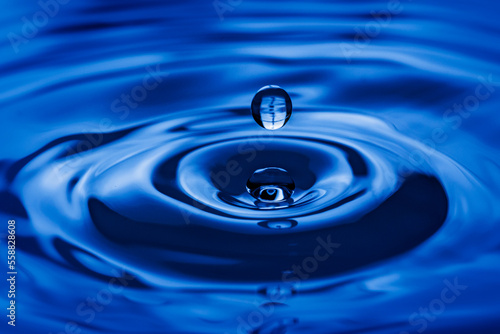water drop splash blue closeup