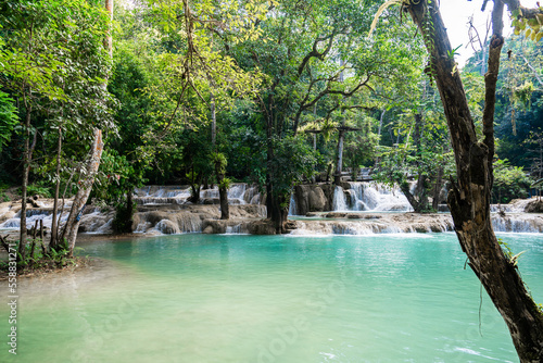 ad Sae Waterfall,Luang Prabang,Laos.Waterfall forest with rock and turquoise blue pond. © natara