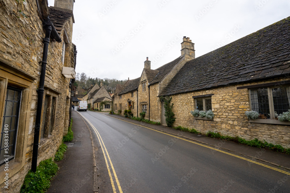 Castle Combe , Beautiful village in Cotwolds with old stone houses bridge and river during winter in Wiltshire , United Kingdom : 6 March 2018