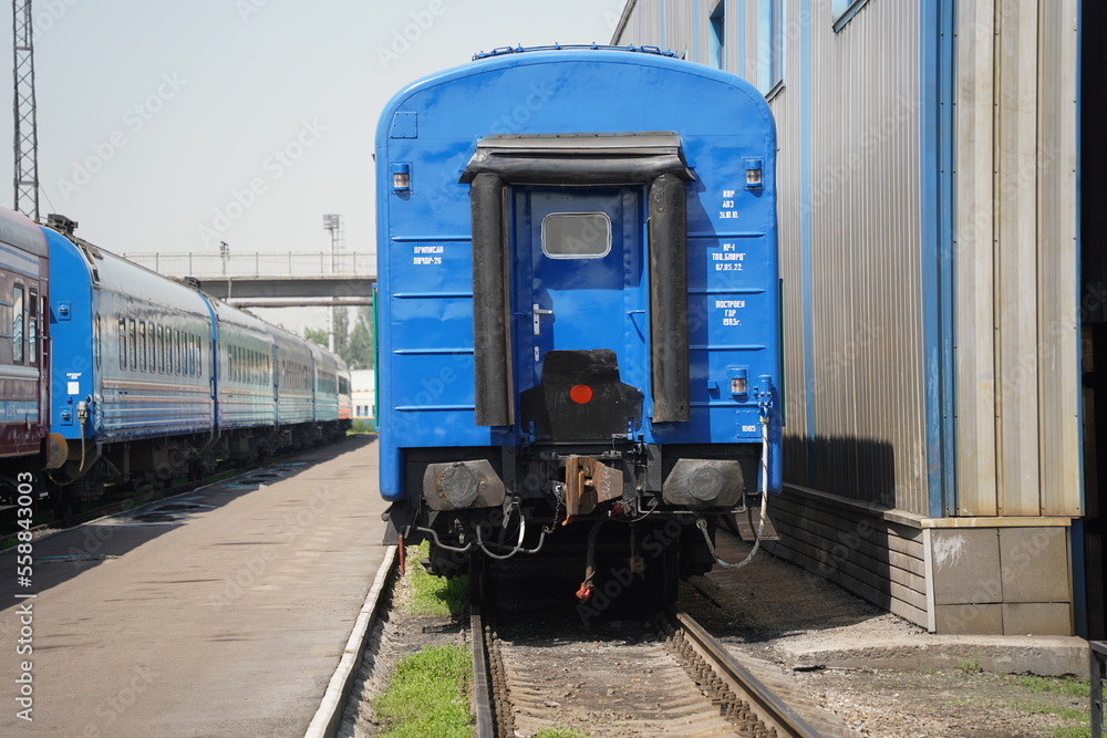 Almaty, Kazakhstan - 05.20.2022 - Passenger train cars at the technical inspection point at the station. Almaty, Kazakhstan - 05.20.2022 - Passenger train cars at the technical inspection point at the station.