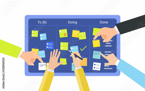 Team planning weekly schedule tasks on task board. Team and schedule planning with filling doing and done work done.
