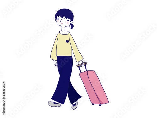 キャリーケースをひく女性