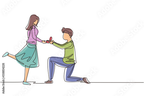 Single continuous line drawing man kneeling offering engagement ring to his girlfriend. Young guy on knees proposing girl to marry. Marriage proposal concept. One line draw design vector illustration