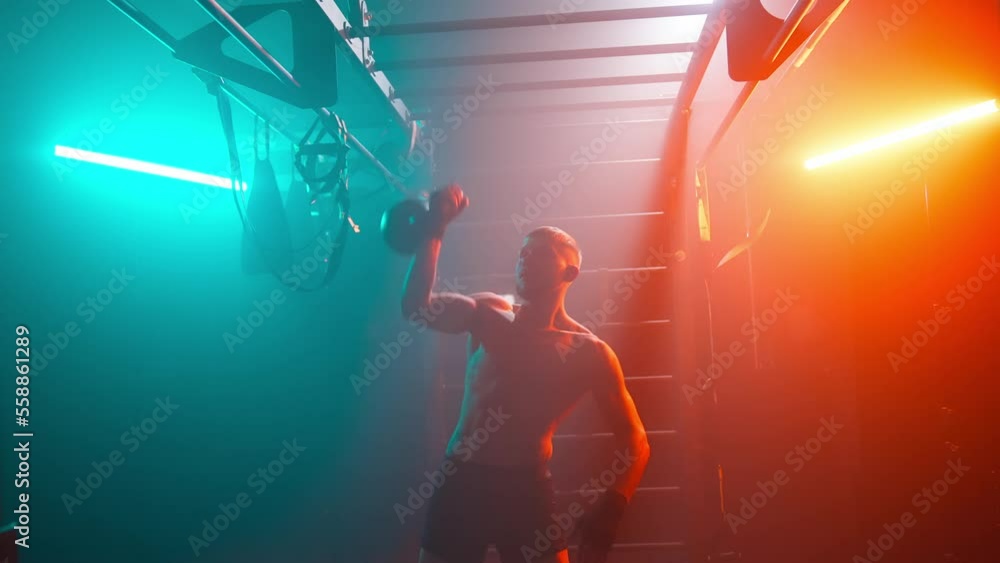MMA fighters enter the cage ring. Mixed martial arts fight. Cinematic staged fight. Boxing in a ring or cage. Two fighters fight for the right to be the champion. MMA fighters enter the cage ring. Mixed martial arts fight. Cinematic staged fight. Boxing in a ring or cage. Two fighters fight for the right to be the champion.