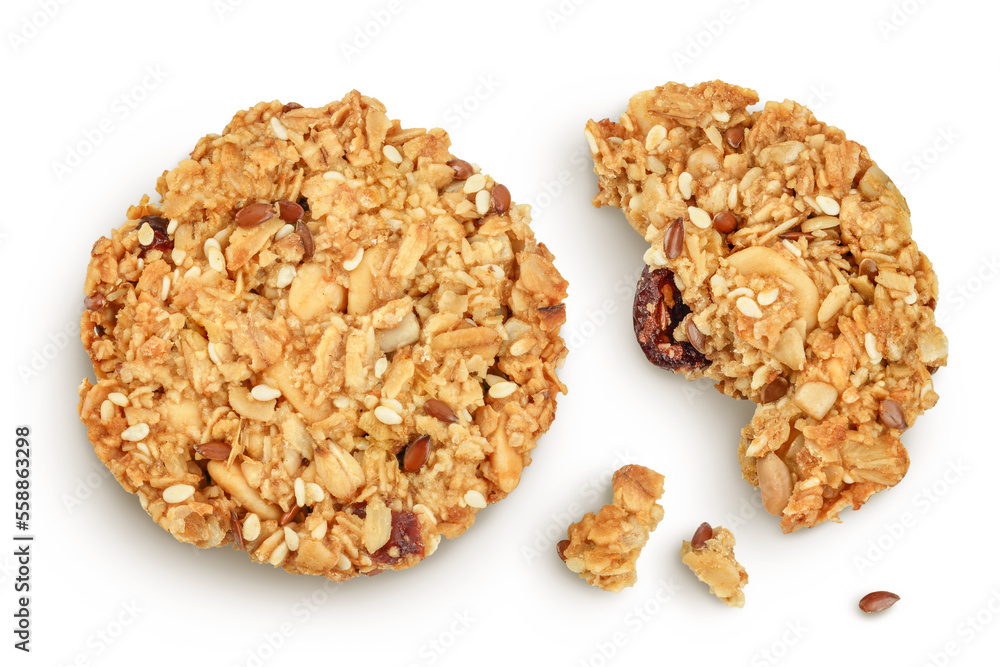 Granola cookie isolated on white background with full depth of field. Top view. Flat lay. Granola cookie isolated on white background with full depth of field. Top view. Flat lay.