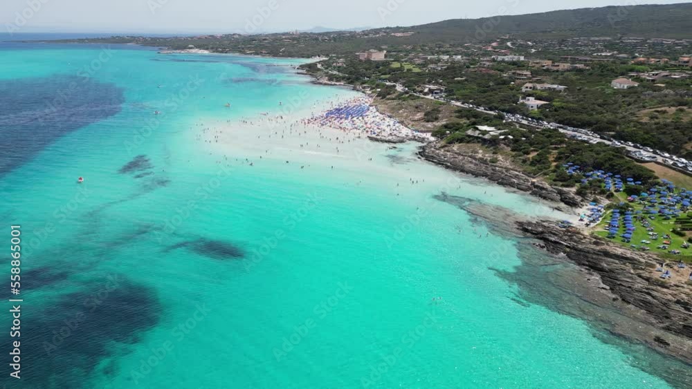 White Sandy La Pelosa Beach during Summer in Sardinia, Italy - 4k Aerial White Sandy La Pelosa Beach during Summer in Sardinia, Italy - 4k Aerial