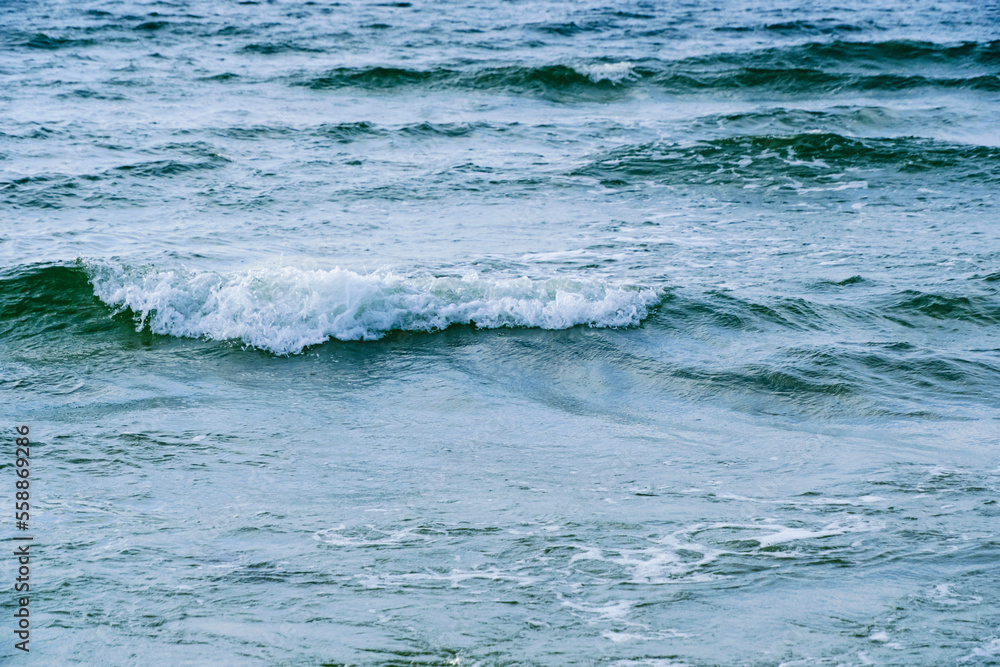 Surf wave with foam splashes on sea. Surf wave with foam splashes on sea.