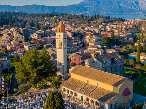 Aerial drone view of Potamos Village with beautiful Church near corfu town , Corfu island, Greece