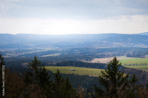 A romantic view of the beautiful valleys and arable fields from the Sto  owe Mountains  a distant view to the horizon  a large space that gives a sense of freedom and independence. Polish Karkonosze  b