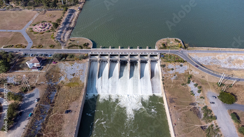 Wallpaper Mural An aerial view over the Pasak Jolasid dam, Lopburi Province, Thailand. Tracking the movement of the floodgates that are releasing water into rural canals in enormous amounts of water. Torontodigital.ca