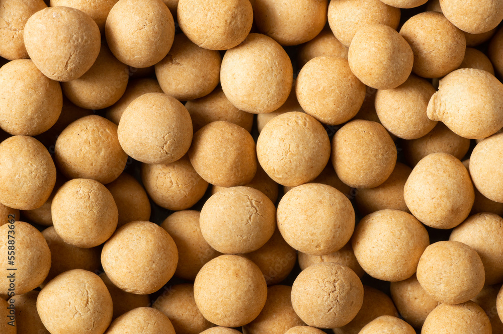 Brown Soy-covered Chickpeas with sauce texture background, traditional turkish coated nut Brown Soy-covered Chickpeas with sauce texture background, traditional turkish coated nut
