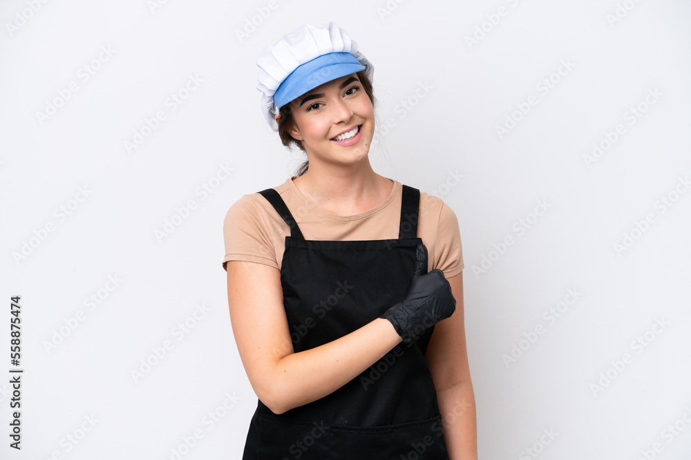 Fishmonger brazilian woman wearing an apron isolated on white background giving a thumbs up gesture Fishmonger brazilian woman wearing an apron isolated on white background giving a thumbs up gesture