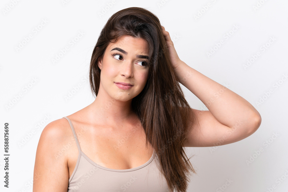 Young Brazilian woman isolated on white background with tangled hair. Close up portrait Young Brazilian woman isolated on white background with tangled hair. Close up portrait