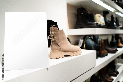 point of sale empty shelf sign poster holder mockup in shoe store