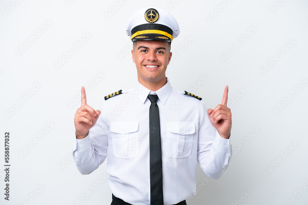 Airplane pilot caucasian man isolated on white background pointing up a great idea Airplane pilot caucasian man isolated on white background pointing up a great idea