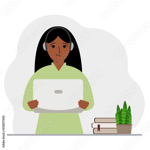 Woman with laptop and headphones. Working from home, student, freelancer, assistant, blogger or businessman. Home office concept.