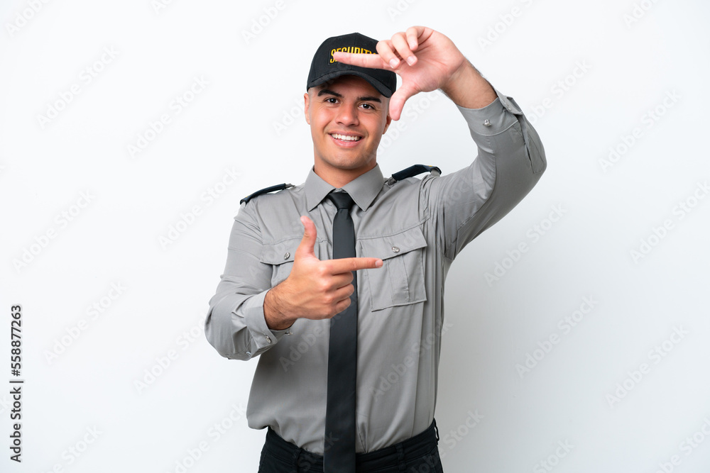 Young caucasian security man isolated on white background focusing face. Framing symbol Young caucasian security man isolated on white background focusing face. Framing symbol