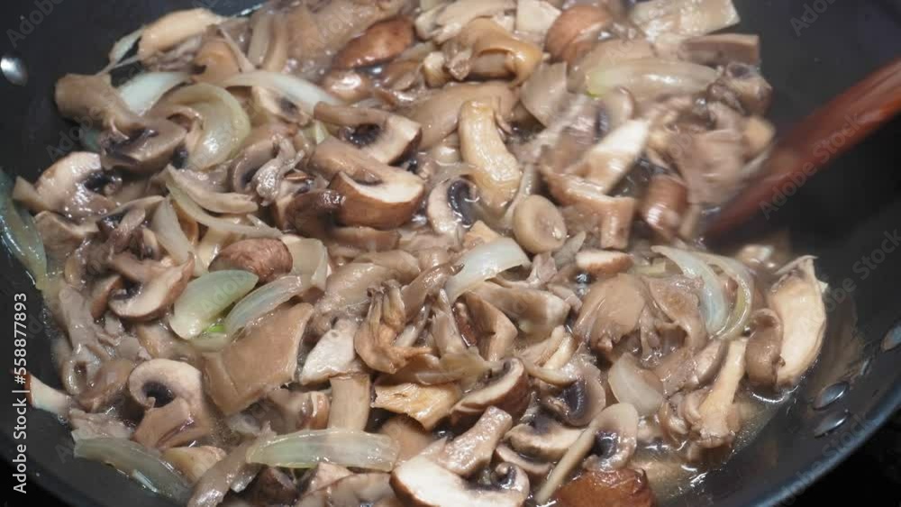 Frying Mushrooms Mix in a Hot Frying Pan, Roasting Oyster Mushrooms with Onion and Black Pepper, Baking Brown Champignon, Cooking Food Frying Mushrooms Mix in a Hot Frying Pan, Roasting Oyster Mushrooms with Onion and Black Pepper, Baking Brown Champignon, Cooking Food